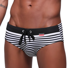 MetroMaleWear stripe swim brief black 4928-03 men’s swim trunks with black waistband and red brand tag on the side