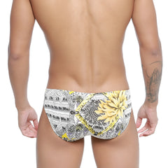 MetroMaleWear sunflower bikini 5103-59 vibrant yellow and black swim trunks with bold floral pattern for swimwear use