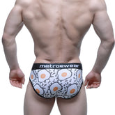 White briefs with cartoon fried eggs pattern and metroewear logo on waistband metro malewear sunny side brief 5203-64
