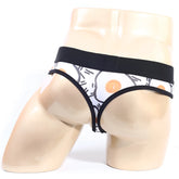 Mens white and black patterned briefs with cartoon egg design and elastic waistband from metromalewear sunny side thong