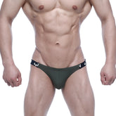 Dark green metro malewear sup bikini briefs with black elastic waistband featuring white lettering