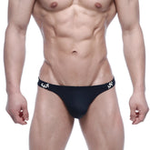 Black metro malewear sup thong briefs with a sleek form-fitting design and white sur branding on the waistband