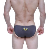 Dark gray metro male wear super lowrise bikini swim trunks with yellow and black batman logo on the back