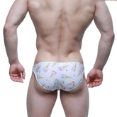 White swim trunks by MetroMaleWear featuring colorful ice cream cone and sprinkle pattern gelato design