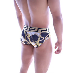 Navy blue and white swim briefs with gold chain and anchor patterns and greek key waistband from MetroMaleWear
