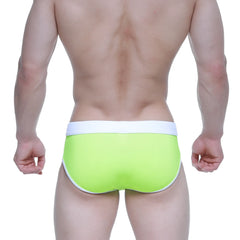 Bright lime green metro male wear swim briefs with white waistband and trim designed for comfortable swimming use