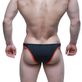 Black swim trunks with vibrant orange trim on sides and waistband from MetroMaleWear TOP Bikini coral 6114-21