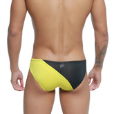 MetroMaleWear TXM bikini black 5143-20 swim trunks feature black and yellow diagonal cut design for stylish swimwear use