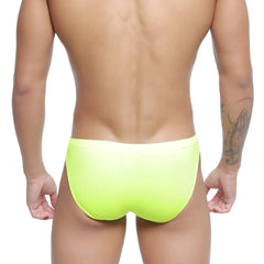 Bright neon yellow swim trunks metroMalewear vanguard swim bikini smooth form-fitting design in neon green