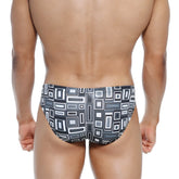 Black and white geometric patterned swim trunks metro malewear vasco hip brief basalto 5103 23 with modern abstract design