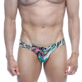 A vibrant metroMalewear vasco hip brief with pink teal and black abstract patterns on a white base