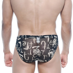 MetroMaleWear Vasco Hip Brief Oraculo 5103-78 black sheer swim trunks with bold white abstract graffiti pattern