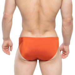 Bright orange metroMaleWear versity swim brief made of smooth stretchy fabric for comfortable swimming use