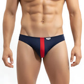 MetroMaleWear volcano thong navy 1322-30 men’s swim trunks with navy blue and red stripes and white waistband tag