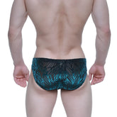 Teal and black leaf-patterned mesh swim trunks from MetroMaleWear Zafiro Bikini 5103-M67