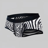 Black and white zebra striped men’s briefs with solid black waistband from mob aero brief collection
