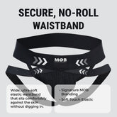 Men’s x jockstrap with black elastic waistband featuring white arrow graphics and mob eroticwear branding visible on back