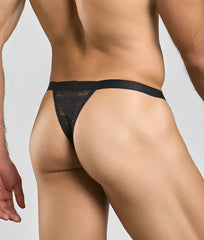 Black lace thong with solid waistband by MOB Y featuring delicate lace material and minimal coverage for sexy appeal
