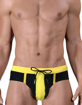 Black and yellow moby big boy pouch swim trunks with drawstring waistband for comfortable beachwear