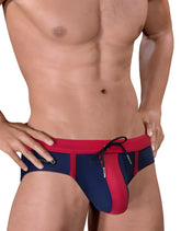 Navy blue and red men’s Moby Big Boy Pouch swim trunks with a drawstring waistband for comfortable swimming