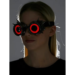 Black spiked neon light up goggles with glowing red circular lights for rave and cosplay use