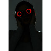Neon light up goggles with red led-lit circular glowing lenses for vibrant night or party use