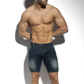 Dark blue denim bermuda jeans shorts with faded wash and classic stitching in new denim style