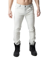 Light gray slim-fit denim jeans with classic five-pocket design and rolled cuffs from NP JEAN bleached collection