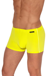 Man wearing bright yellow Olaf Benz beachpants with a white side stripe and a small brand logo tag.
