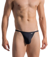 Black form-fitting thong with sleek minimalist design and subtle waistband branding shown from the back by OLAF BENZ 0965 RIOTANGA