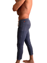 Performance premium mens navy blue heather capri yoga pants with textured fabric white drawstring and orange tag