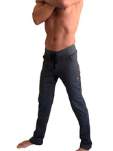 Performance-premiumlong cuffed jogger charcoal heather sweat pants with drawstring waistband and orange logo on thigh