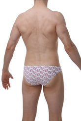 White briefs with a repeating pink cartoon pig face pattern from petitq bikini dome piggy love collection