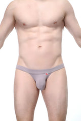 Gray men’s thong with a small red logo on the waistband made of organic bamboo from petitq bikini sillas organic bamboo peanut