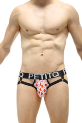 PetitQ jockstrap ciran lollipop pink lollipop-patterned men’s briefs with black elastic waistband and side straps