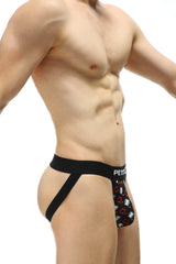 Black and red devil-themed jockstrap with branded waistband by PetitQ Millesime showing front side design