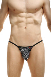Black thong petitq kini bandana with white paisley pattern and small red logo on the front