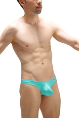 Shiny turquoise PetitQ thong Bulan Joe Green swim trunks with sleek form-fitting design for swimming