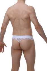White thong featuring a pink cartoon pig face pattern from petitq thong hole cockring piggy love collection