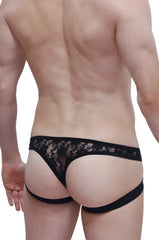 PetitQ thong jockstrap in black lace with delicate floral pattern and supportive side straps shown from the back