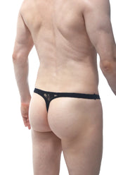 Black lace thong from PetitQ with a solid band and delicate floral pattern shown from the back side
