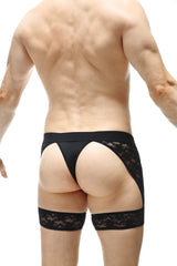 Black lace thong with matching leg cuffs by petitq featuring intricate lace detailing in black material