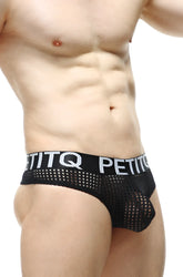 Black mesh briefs with white petitq logo band from the petitq thong mega bulge durtol collection