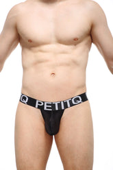 Black petitq thong migny satin in satin featuring a wide waistband with white lettering visible from the back side