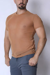 Tan form-fitting phantom mesh t-shirt with short sleeves and crew neck made from breathable fabric