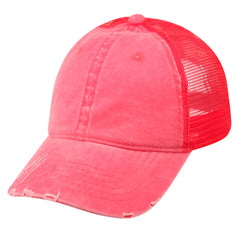 A vibrant coral pink pigment dyed washed cotton trucker cap with distressed front and matching mesh back