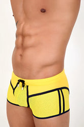 Bright yellow mesh pistol pete atomic midcut square cut swim trunks with black trim and side stripes size small
