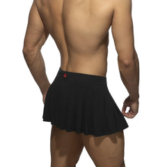 Black pleated ring skirt with a red logo on the waistband made from lightweight fabric for stylish wear