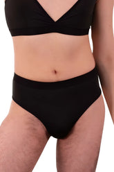 Black plural pl004 briefs with smooth stretchy fabric and fitted high-waisted design shown from the front
