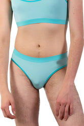 Light blue sheer mesh bikini bottom with turquoise trim in plural pl006 briefs color mint green shown from front